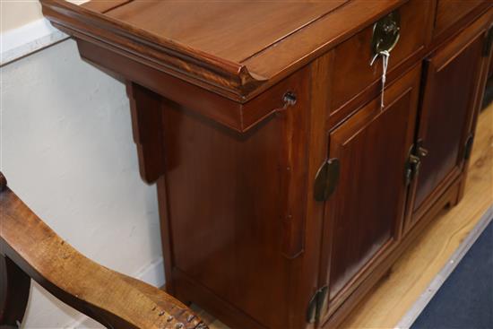 A Chinese padouk wood cabinet W.124cm